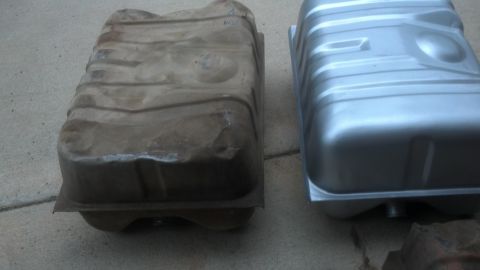 1995 Ford Bronco - A comparison of a used, corroded fuel tank next to a newly restored or replacement unit.