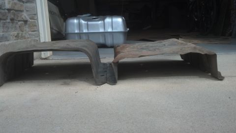 1995 Ford Bronco - Two protective metal shields are shown next to a new gas tank.
