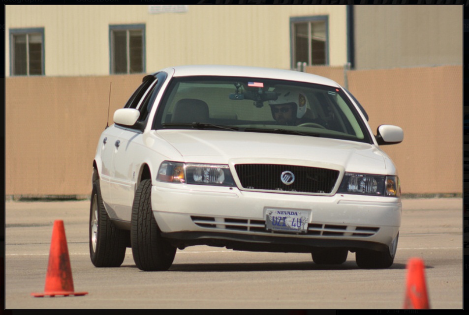 White 2000 Mercury Grand Marquis front view with Nevada license plate