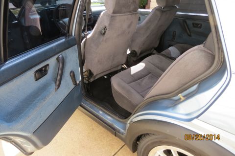 1990 Volkswagen Jetta - Interior view of a 1990 Volkswagen Jetta, highlighting the fabric seats and door trim.