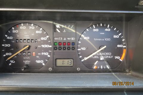 1990 Volkswagen Jetta - Dashboard gauges include a speedometer, tachometer, fuel gauge, and a digital clock displaying 1:13.