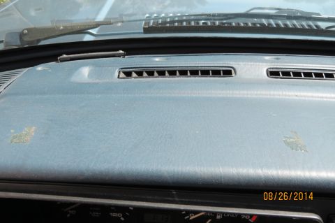 1990 Volkswagen Jetta - Interior view of a blue dashboard with visible air vents and a date stamp from 2014.