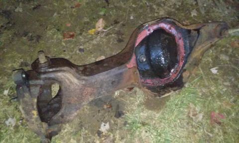 1994 Ford Bronco - A differential axle assembly, likely from a truck or SUV, is shown with visible red gasket sealant.