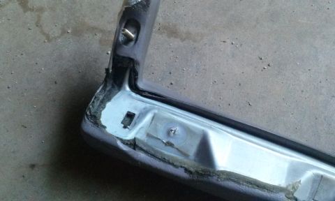 1994 Ford Bronco - This photo shows a damaged car bumper section, not a complete 1994 Ford Bronco.
