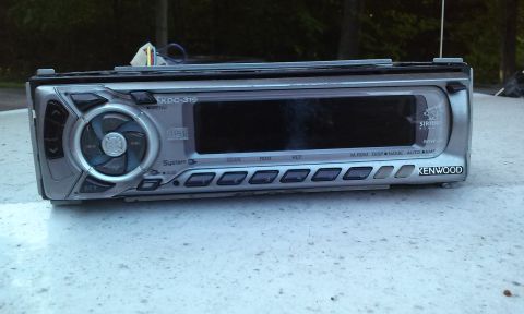 1994 Ford Bronco - Kenwood KDC-319 car stereo unit, Sirius satellite radio compatibility and a CD player.
