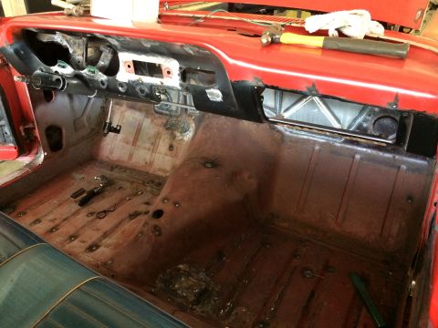 1964 Ford Fairlane - The interior of a car is shown with the dashboard removed, indicating ongoing restoration work.