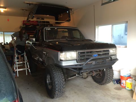 1989 Ford Bronco - This 1989 Ford Bronco is shown with its removable top stored overhead in a garage.
