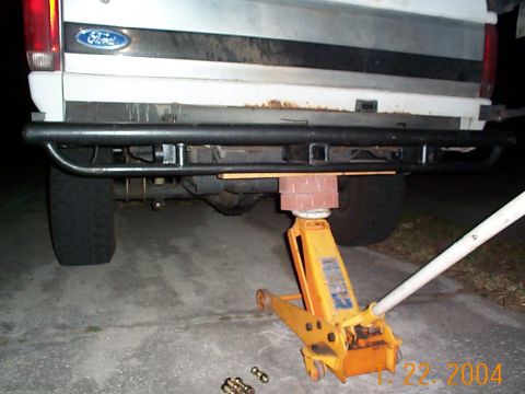 1992 Ford Bronco - Jacking the bumper with the new mounts into place.