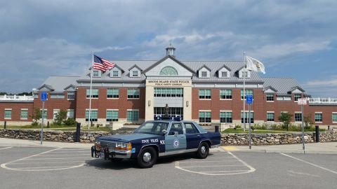1991 Ford LTD Crown Victoria - A 1991 Ford Crown Victoria police car is parked outside the Rhode Island State Police Public Safety Complex.