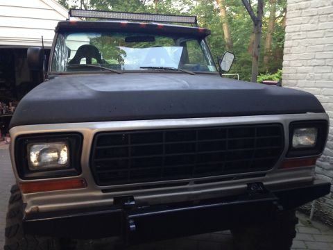 1979 Ford Bronco - Front view of a 1979 Ford Bronco with a custom bumper and light bar.