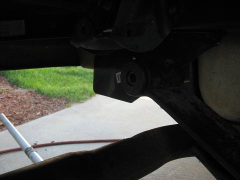 1994 Ford Bronco - Close-up of a leaf spring bushing mount, likely from a truck or SUV.