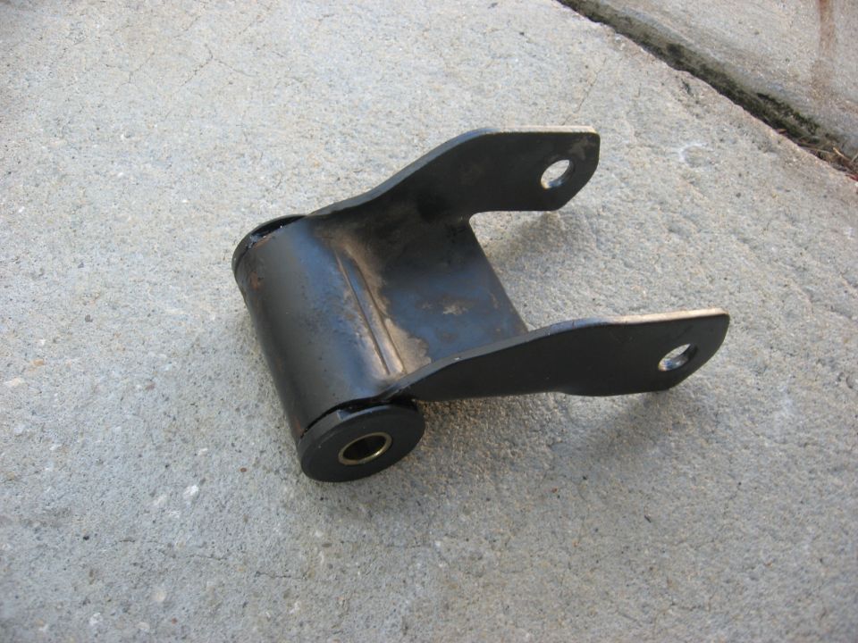 Leaf spring shackle part on concrete