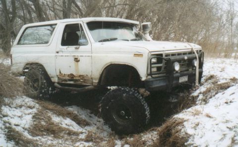 1980 Ford Bronco - Trying to climb out the other wall.