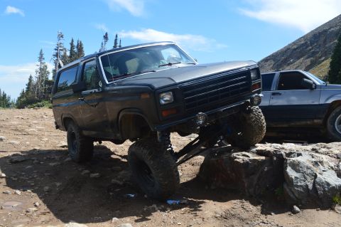 1983 Ford Bronco - This 1980 Ford Bronco navigates a rocky trail, its off-road capabilities.