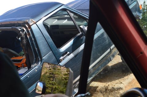 1983 Ford Bronco - This truck appears to be a Ford F-Series from the late 1980s, possibly 1987, with damage to its roof.