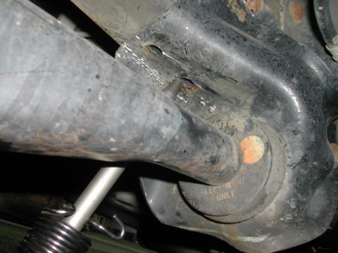 1996 Ford Bronco - First 2 rivets have been cut and punched out. Time for the 3rd rivet.