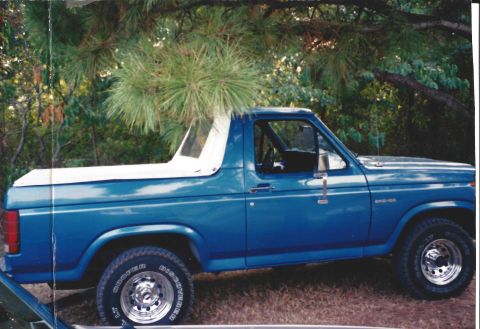 1982 Ford Bronco - This 1982 Ford Bronco is seen from the side, its distinctive white removable top.