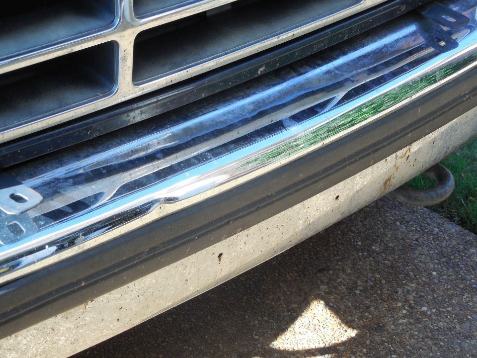 Just a tiny dent in the recently-new aftermarket front bumper.