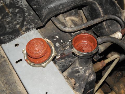 1993 Ford Bronco - The water pump is still shiny & clean, so I can't imagine why there's THIS MUCH rust in the coolant. I found out it's low because 1) the up…