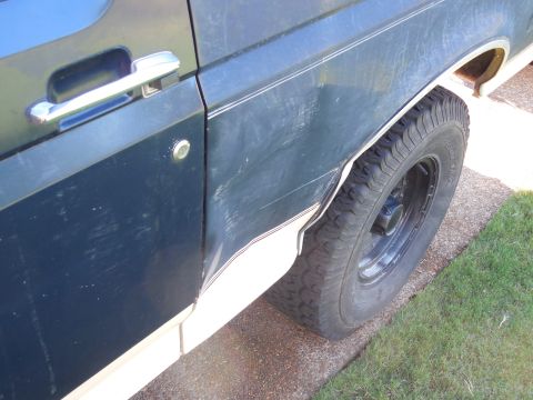 1993 Ford Bronco - This is the dent that I intentionally left to remind him to be more careful.