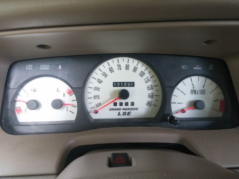 2000 Mercury Grand Marquis - The dashboard of a Grand Marquis LSE displays the speedometer, odometer reading 131,250 miles, and other gauges.