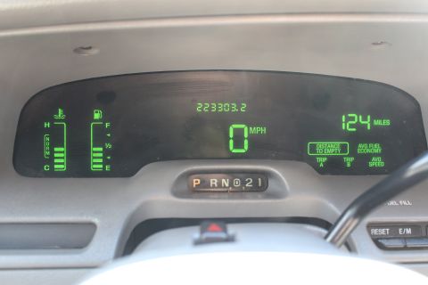 2002 Mercury Grand Marquis - The digital dashboard displays the odometer reading of 223303.2 miles and current speed of 0 MPH.