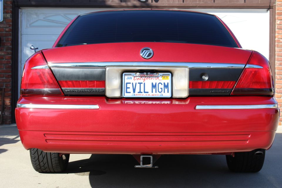 Red 2002 Mercury Grand Marquis rear with California plate EVIL MGM