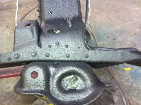 1982 Ford Bronco - A vehicle frame part, possibly from a truck or SUV, is shown after being coated.