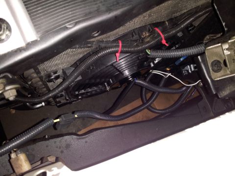 1976 Ford Ranchero - Close-up of a vehicle's radiator fan and associated wiring, with a SuperMotors.net watermark visible.
