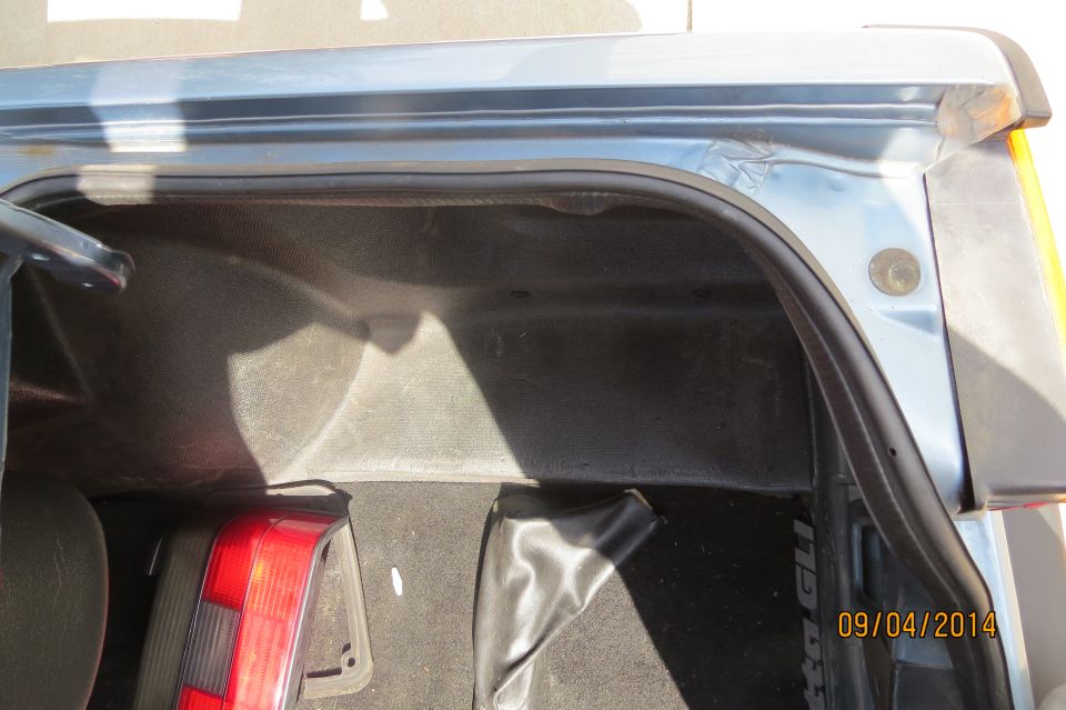 Trunk interior with taillight and boot cover
