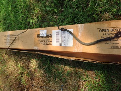 1979 Ford Bronco - A brake hose lies on a box from Wild Horses Four Wheel Drive.