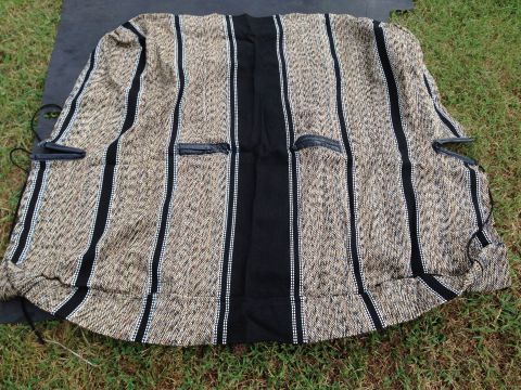 1979 Ford Bronco - Woven car seat cover with black and tan stripes and black leather accents.