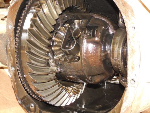 1993 Ford Bronco - The source of the noise was apparent as soon as the cover came off because one of the carrier bearing caps came off with it. One whole bolt…