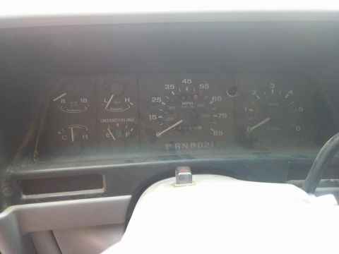 2000 Mercury Grand Marquis - Interior view of a vehicle's dashboard gauges, showing speed, fuel, and engine status.