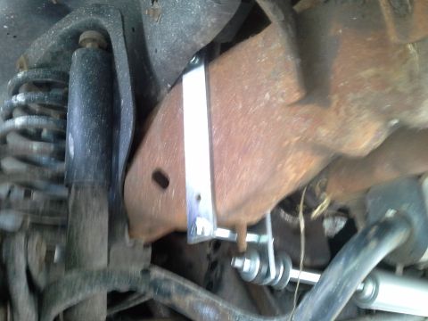 1996 Ford Bronco - Slid the bracket to the correct locattion behind that metal stud