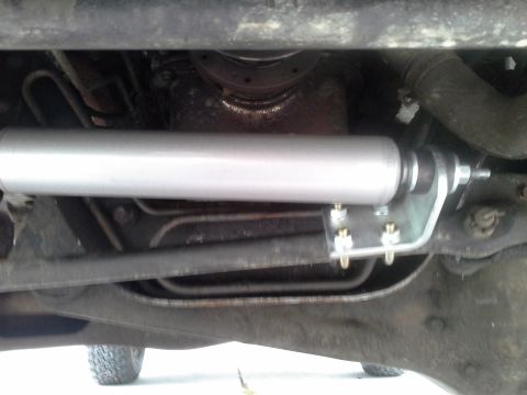 1996 Ford Bronco - Extended the shock absorber 4.5 inches and attached the tie rod bracket and u bolts