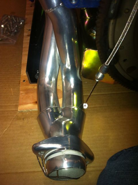 1982 Ford Bronco - Close-up of engine exhaust headers and associated components.