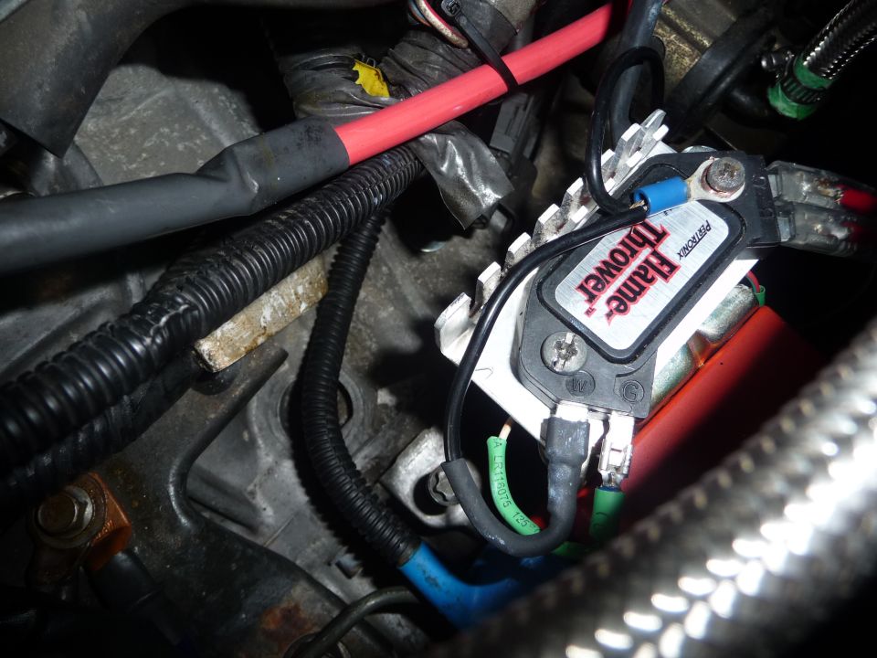 Pertronix Flame Thrower ignition module with red and black wires connected