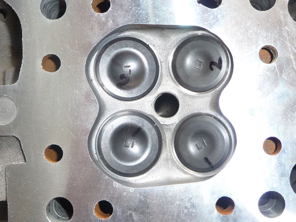 Engine cylinder head with four valves, marked 'LI' and '2'