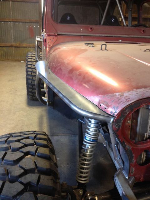 1985 Jeep CJ7 - Modified 1985 Jeep CJ7 front end with custom fender and large off-road tire.