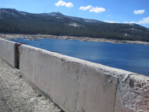 1989 Ford Bronco - View of a lake and mountains from a concrete barrier on a clear day.