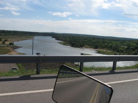 1982 Ford Bronco - Reflection in the side mirror reveals a scenic view of a river and surrounding landscape.