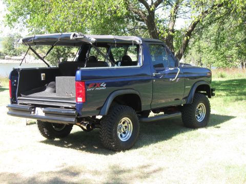 1982 Ford Bronco - This 1982 Ford Bronco is shown with its soft top removed, revealing the interior and cargo area.