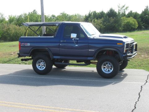 1982 Ford Bronco - This lifted 1982 Ford Bronco features a removable soft top and aggressive off-road tires.