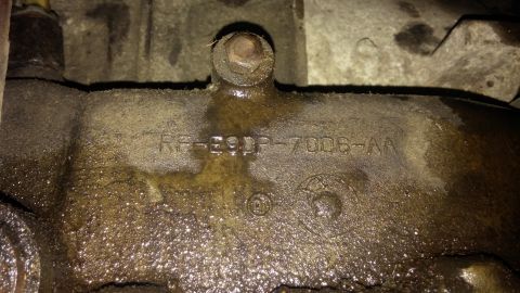 1986 Ford Bronco - Engine part with casting numbers RP-E9DP-7006-AA visible.