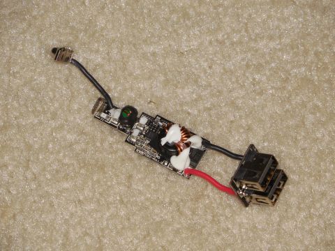 1993 Ford Bronco - The guts of a 4.8Amp USB power adapter will be mounted in the dash and controlled by a switch for charging phones, GPSs, and cameras.