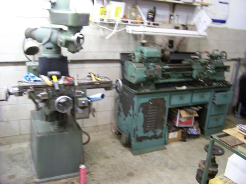 1974 Dodge Challenger - Workshop scene with industrial machinery including a milling machine and a lathe.