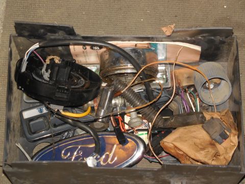 1993 Ford Bronco - Emblems, fender shims, radio connectors, HomeLink & pigtail, manual... All in a battery cover.