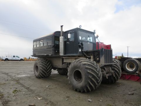 1990 Ford F-250 - This custom vehicle combines a truck chassis with a bus body and massive tires.