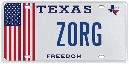2000 Mercury Grand Marquis - A Texas license plate displays the American flag and the custom text ZORG.